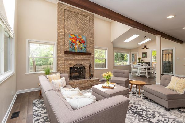 Dining room, Fireplace, Interior, Living room, Pendant Lights, Recessed Lighting, Stone Walls, Wooden Beams, Wood Texture Flooring
