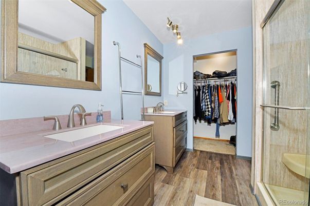 Bathroom, Dual Sink Vanities, Glass Shower, Interior, Walk-in Closets, Wood Texture Flooring