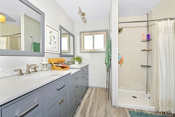 Bathroom, Dual Sink Vanities, Glass Shower, Interior, Wood Texture Flooring