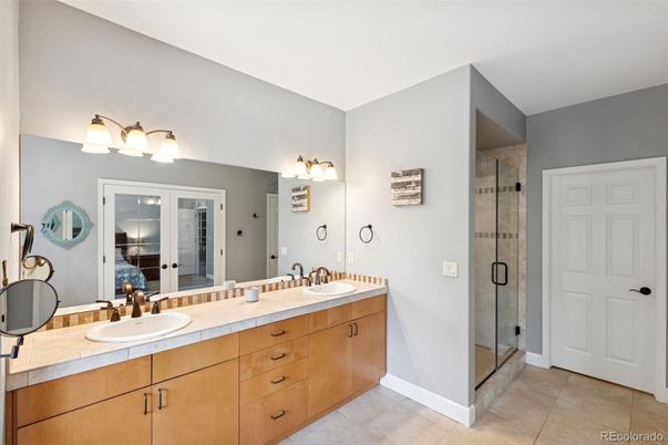 Bathroom, Dual Sink Vanities, Glass Shower, Interior, Tile Countertops