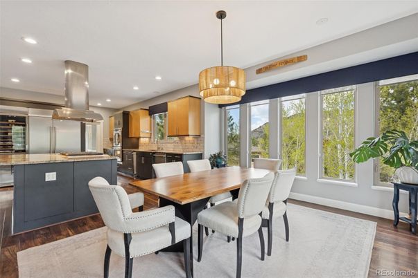Dining room, Interior, Kitchen, Pendant Lights, Recessed Lighting, Stainless Steel Appliances, Wood Texture Flooring
