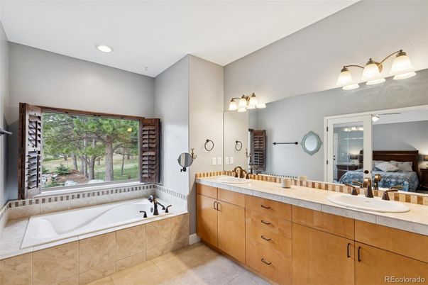 Bathroom, Dual Sink Vanities, Interior, Recessed Lighting, Tile Countertops