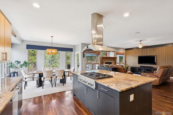 Chandelier, Dining room, Fireplace, Interior, Kitchen, Living room, Pendant Lights, Recessed Lighting, Wood Texture Flooring