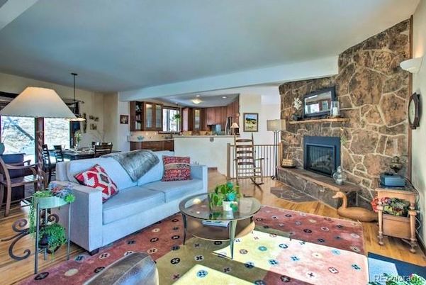 Dining room, Fireplace, Interior, Kitchen, Living room, Pendant Lights, Recessed Lighting, Stone Walls, Wood Texture Flooring