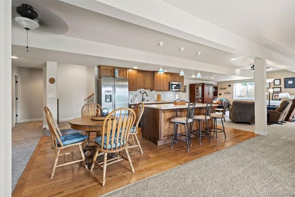Dining room, Interior, Kitchen, Pendant Lights, Recessed Lighting, Stainless Steel Appliances, Wood Texture Flooring
