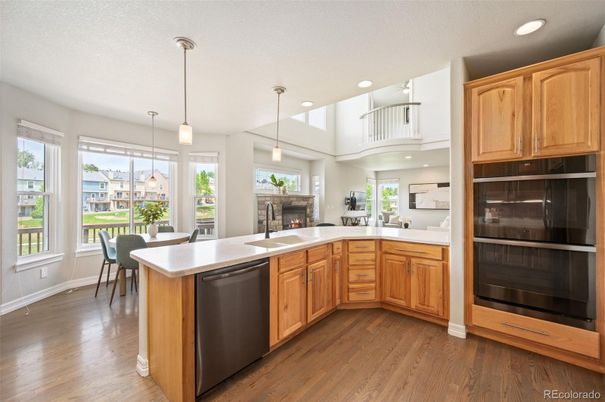 Dining room, Fireplace, Interior, Kitchen, Pendant Lights, Recessed Lighting, Wood Texture Flooring