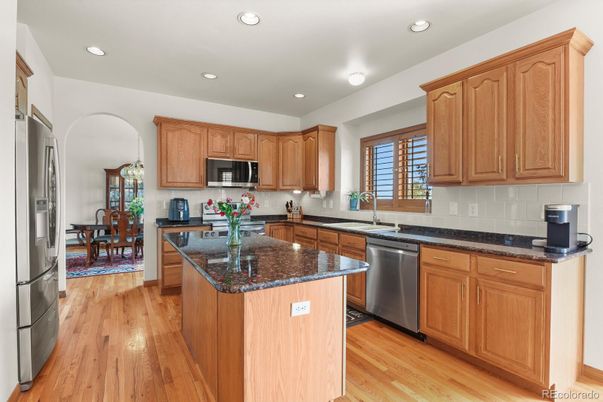 Dining room, Interior, Kitchen, Recessed Lighting, Stainless Steel Appliances, Wood Texture Flooring