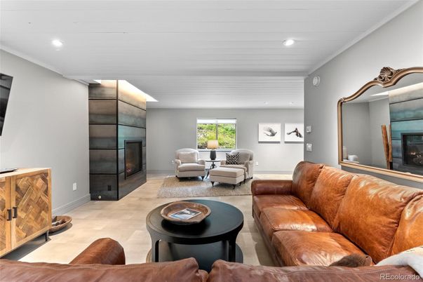 Fireplace, Interior, Living room, Recessed Lighting, Wood Texture Flooring