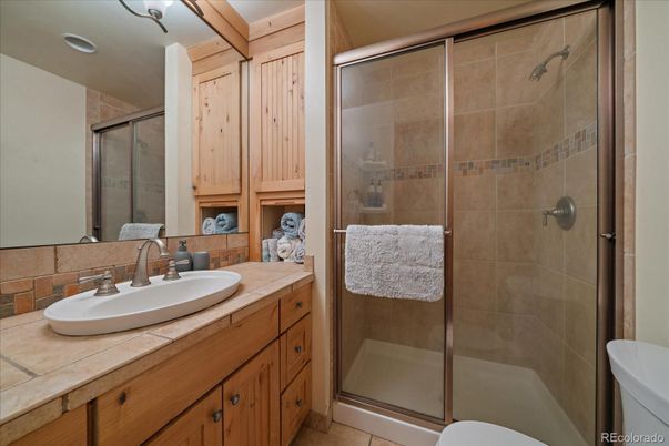 Bathroom, Glass Shower, Interior, Recessed Lighting, Tile Countertops