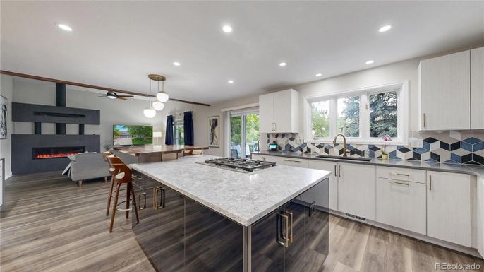 Dining room, Fireplace, Interior, Kitchen, Pendant Lights, Recessed Lighting, Wood Texture Flooring
