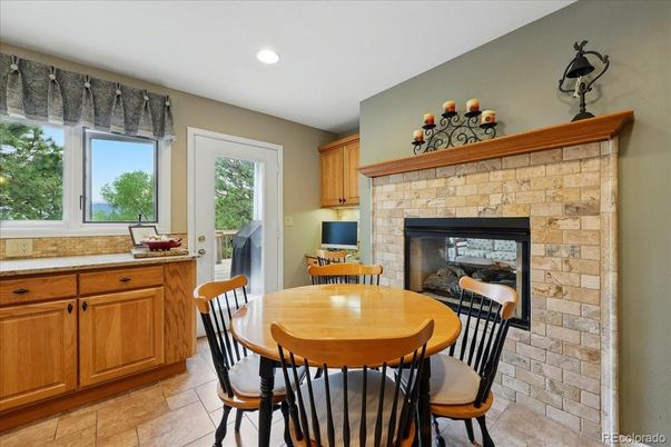 Dining room, Fireplace, Interior, Recessed Lighting, Stone Walls