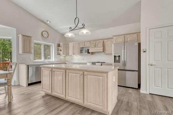 Interior, Kitchen, Pendant Lights, Recessed Lighting, Stainless Steel Appliances, Wood Texture Flooring