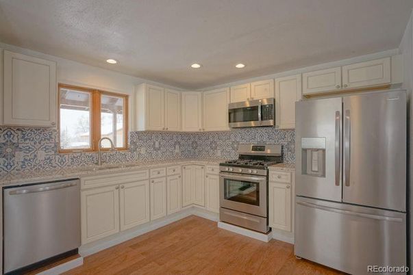 Interior, Kitchen, Recessed Lighting, Stainless Steel Appliances, Wood Texture Flooring