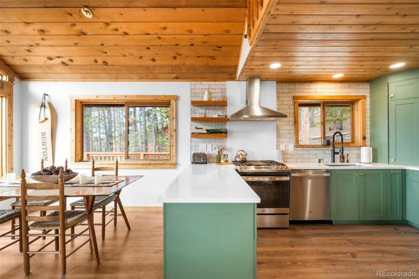 Dining room, Interior, Kitchen, Recessed Lighting, Stainless Steel Appliances, Wooden Ceilings, Wood Texture Flooring