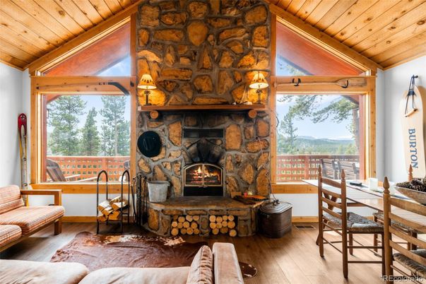 Dining room, Fireplace, Interior, Stone Walls, Wooden Ceilings, Wood Texture Flooring