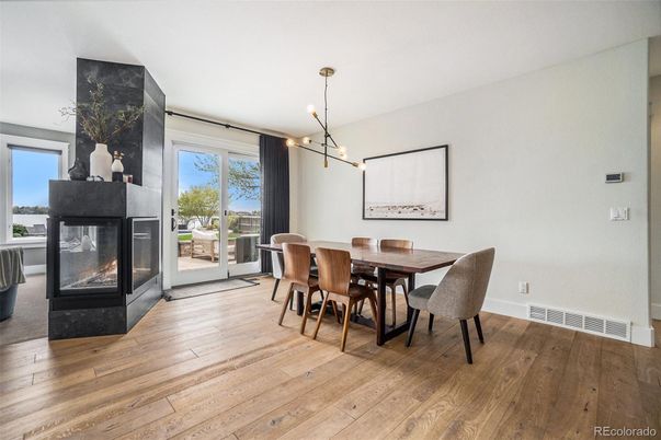 Dining room, Fireplace, Interior, Pendant Lights, Wood Texture Flooring