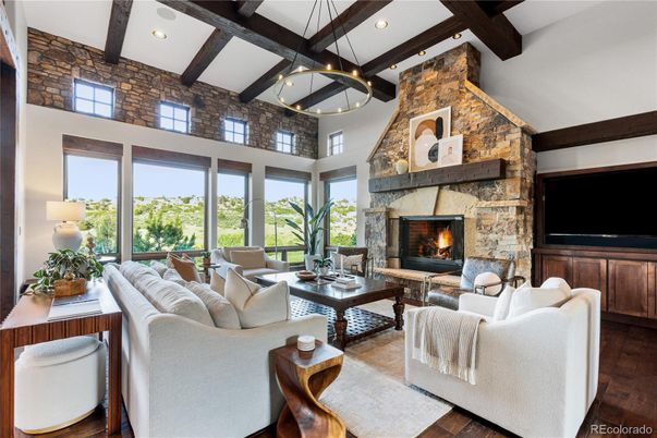 Fireplace, Interior, Living room, Pendant Lights, Recessed Lighting, Stone Walls, Wooden Beams, Wood Texture Flooring