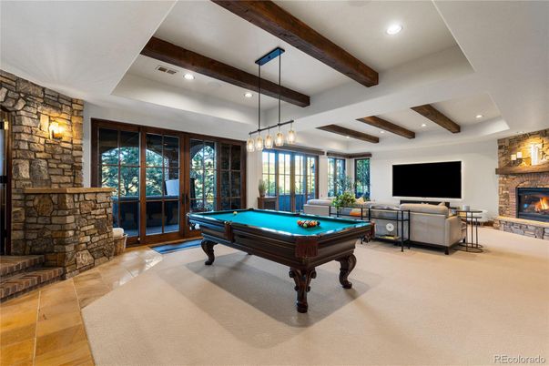 Billiard Table, Fireplace, Game Room, Interior, Living room, Pendant Lights, Recessed Lighting, Stone Walls, Wooden Beams