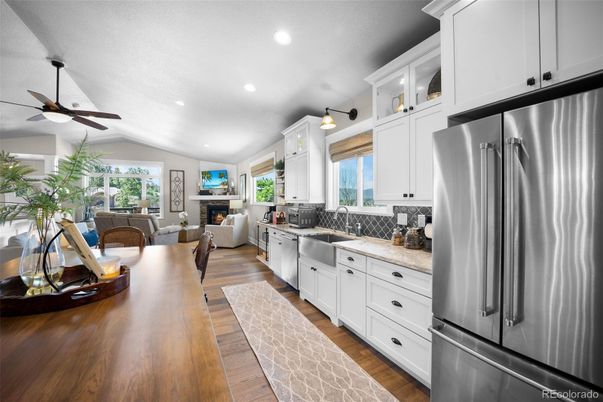 Dining room, Fireplace, Interior, Kitchen, Living room, Pendant Lights, Recessed Lighting, Wood Texture Flooring