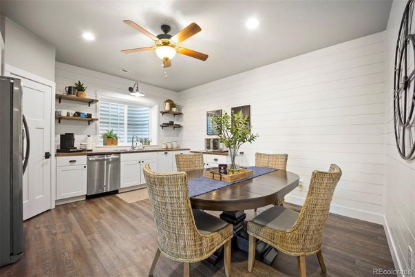 Dining room, Interior, Kitchen, Recessed Lighting, Stainless Steel Appliances, Wood Texture Flooring