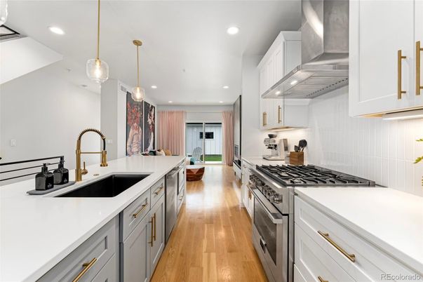 Interior, Kitchen, Pendant Lights, Recessed Lighting, Stainless Steel Appliances, Wood Texture Flooring