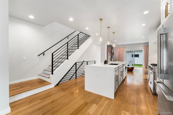 Interior, Kitchen, Pendant Lights, Recessed Lighting, Stainless Steel Appliances, Wood Texture Flooring