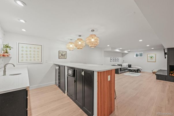 Chandelier, Fireplace, Interior, Living room, Recessed Lighting, Wood Texture Flooring