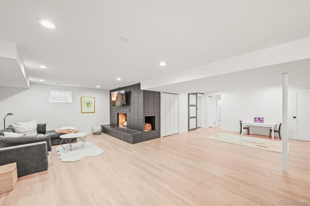 Fireplace, Interior, Living room, Recessed Lighting, Wood Texture Flooring