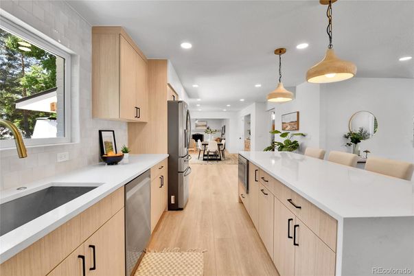 Dining room, Interior, Kitchen, Pendant Lights, Recessed Lighting, Stainless Steel Appliances, Wood Texture Flooring