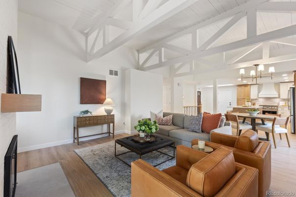 Chandelier, Dining room, Fireplace, Interior, Kitchen, Living room, Stainless Steel Appliances, Wood Texture Flooring