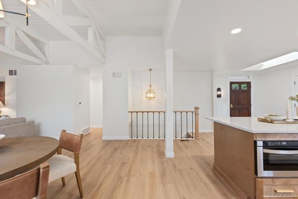 Dining room, Interior, Kitchen, Pendant Lights, Recessed Lighting, Stainless Steel Appliances, Wood Texture Flooring