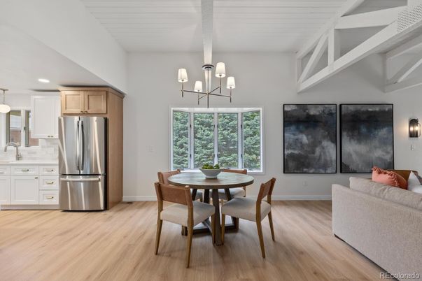 Chandelier, Dining room, Interior, Kitchen, Recessed Lighting, Stainless Steel Appliances, Wood Texture Flooring