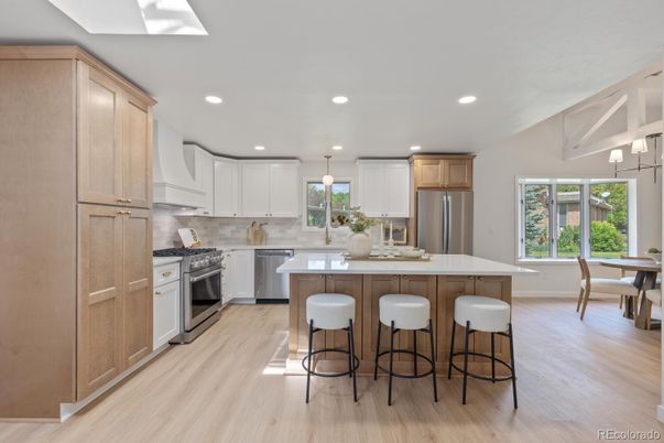Dining room, Interior, Kitchen, Pendant Lights, Recessed Lighting, Stainless Steel Appliances, Wood Texture Flooring