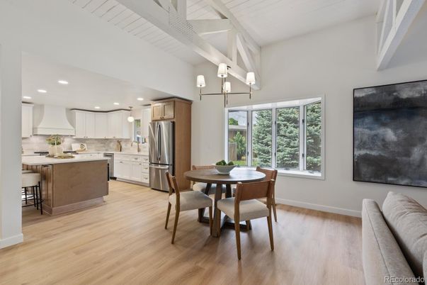 Chandelier, Dining room, Interior, Kitchen, Recessed Lighting, Stainless Steel Appliances, Wood Texture Flooring