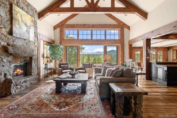 Fireplace, Interior, Living room, Recessed Lighting, Stone Walls, Wooden Beams, Wood Texture Flooring