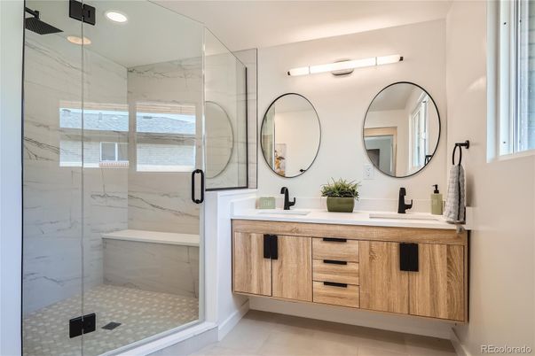 Bathroom, Dual Sink Vanities, Glass Shower, Interior, Marble Walls, Recessed Lighting