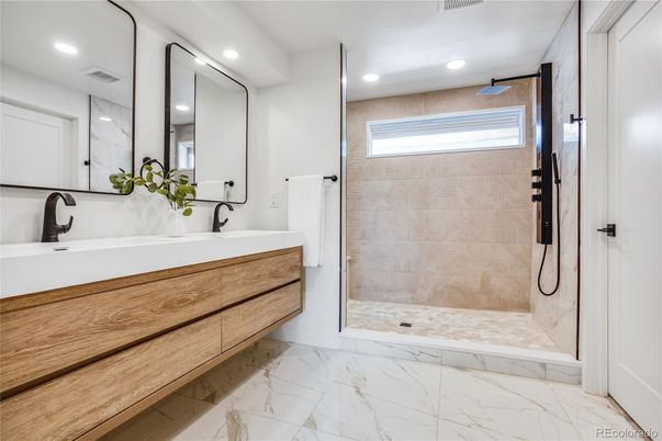 Bathroom, Dual Sink Vanities, Glass Shower, Interior, Marble, Recessed Lighting