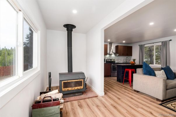 Fireplace, Interior, Kitchen, Living room, Recessed Lighting, Wood Texture Flooring