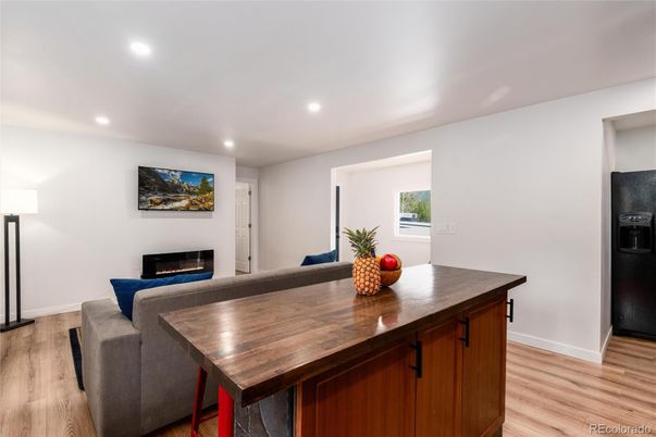 Dining room, Fireplace, Interior, Recessed Lighting, Wood Texture Flooring