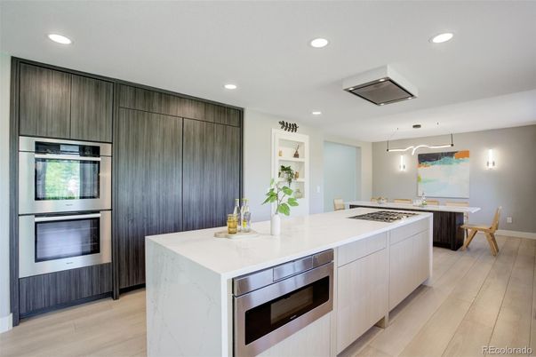 Dining room, Interior, Kitchen, Pendant Lights, Recessed Lighting, Stainless Steel Appliances, Wood Texture Flooring