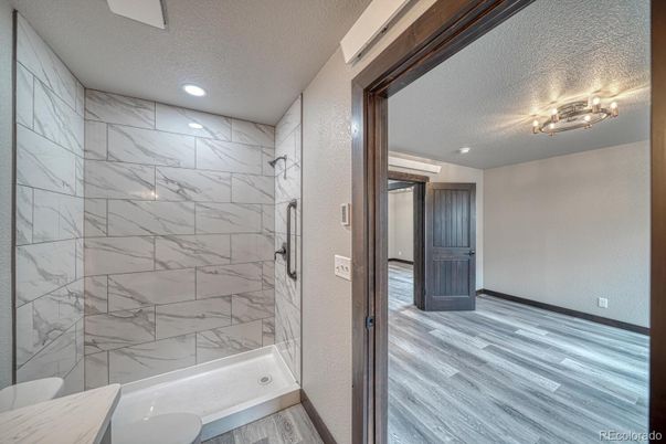 Bathroom, Interior, Marble Walls, Recessed Lighting, Wood Texture Flooring