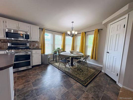 Chandelier, Dining room, Interior, Kitchen, Stainless Steel Appliances