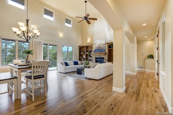 Chandelier, Dining room, Fireplace, Interior, Living room, Recessed Lighting, Wood Texture Flooring