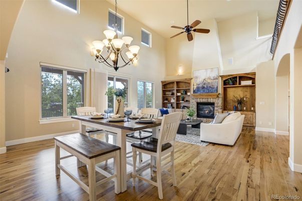 Chandelier, Dining room, Fireplace, Interior, Living room, Wood Texture Flooring