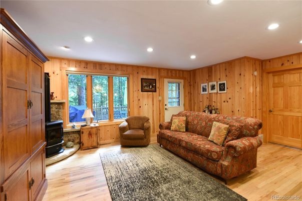 Fireplace, Interior, Living room, Recessed Lighting, Wood Texture Flooring, Wooden Walls