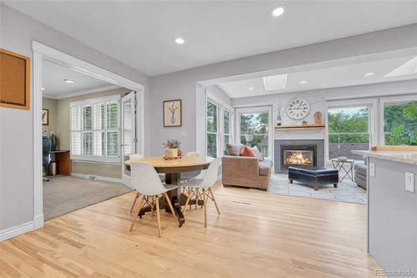 Dining room, Fireplace, Interior, Living room, Recessed Lighting, Wood Texture Flooring
