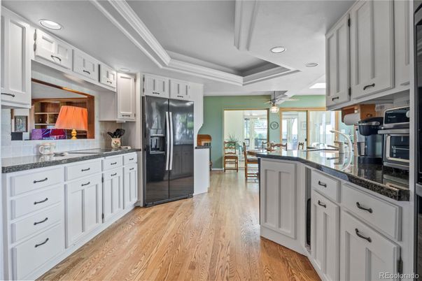 Dining room, Interior, Kitchen, Recessed Lighting, Stainless Steel Appliances, Wood Texture Flooring