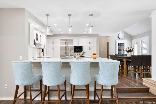 Dining room, Interior, Kitchen, Pendant Lights, Recessed Lighting, Stainless Steel Appliances, Wood Texture Flooring