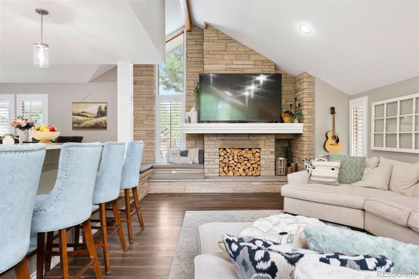 Fireplace, Interior, Living room, Pendant Lights, Recessed Lighting, Stone Walls, Wood Texture Flooring