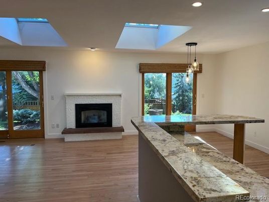 Fireplace, Interior, Pendant Lights, Recessed Lighting, Wood Texture Flooring